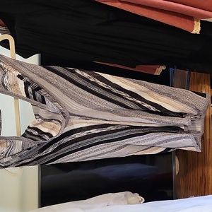 Sleek women's halter top, silver, gold black & white vertical stripes